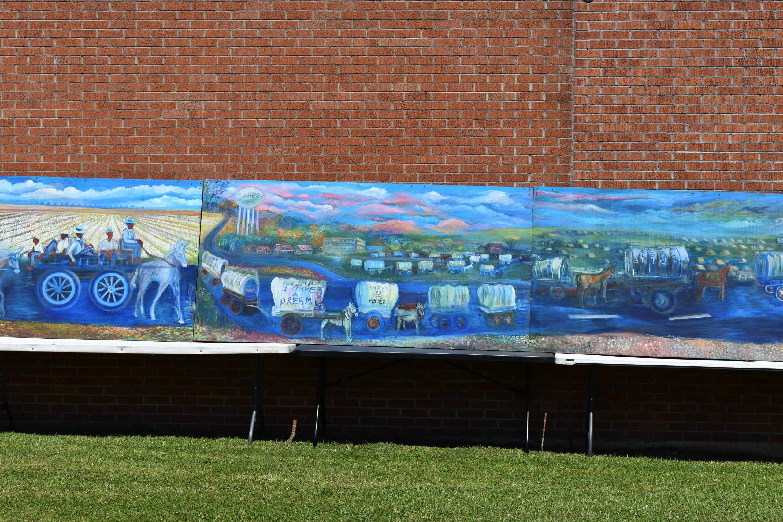 Photo of mural of historic Mule Train procession