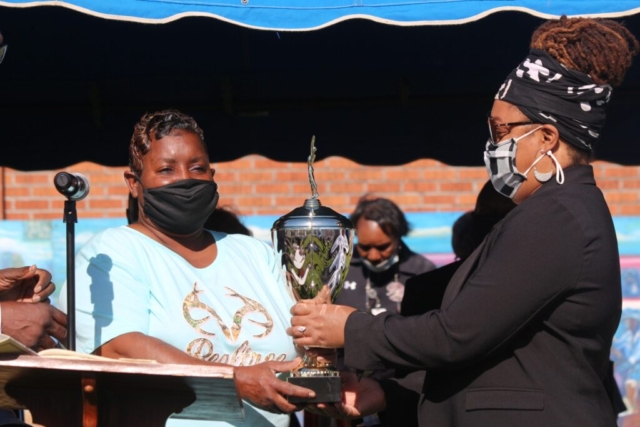 TWo women with trophy